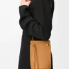 Bolsa para dados Pebble en piel de becerro clásica Bolsa para dados Pebble en piel de becerro clásica