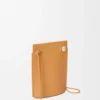 Bolsa para dados Pebble en piel de becerro clásica Bolsa para dados Pebble en piel de becerro clásica