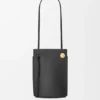 Bolsa para dados Pebble en piel de becerro clásica Bolsa para dados Pebble en piel de becerro clásica