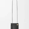 Bolsa para dados Pebble en piel de becerro clásica Bolsa para dados Pebble en piel de becerro clásica