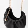 Bolsa «Squeeze» mediana en piel de cordero napa suave Bolsa «Squeeze» mediana en piel de cordero napa suave