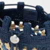 Bolsillo con cordón en piel de becerro clásica y rafia Bolsillo con cordón en piel de becerro clásica y rafia