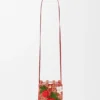 Bolsita con cordón «Strawberry» en piel de becerro clásica y rafia Bolsita con cordón «Strawberry» en piel de becerro clásica y rafia