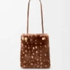Bolsita «Pebble» en piel de oveja estampada Bolsita «Pebble» en piel de oveja estampada