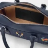Bolso corto Cats Amazona 23 en mezclilla bordada Bolso corto Cats Amazona 23 en mezclilla bordada