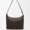 Bolso cruzado Cubi en piel de becerro granulada y flexible Bolso cruzado Cubi en piel de becerro granulada y flexible