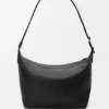 Bolso cruzado Cubi en piel de becerro granulada y flexible Bolso cruzado Cubi en piel de becerro granulada y flexible