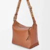 Bolso Cubi Crossbody en piel de becerro lisa y flexible con correa de jacquard Bolso Cubi Crossbody en piel de becerro lisa y flexible con correa de jacquard