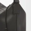 Bolso Cubi Crossbody en piel de becerro lisa y flexible con correa de jacquard Bolso Cubi Crossbody en piel de becerro lisa y flexible con correa de jacquard
