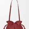 Bolso de mano Flamenco mediano en piel de becerro napa Bolso de mano Flamenco mediano en piel de becerro napa
