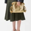 Bolso de mano Flamenco mediano en piel de cordero laminada Bolso de mano Flamenco mediano en piel de cordero laminada