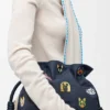 Bolso de mano mediano «Cats Flamenco» en mezclilla bordada