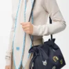 Bolso de mano mediano «Cats Flamenco» en mezclilla bordada