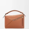 Bolso mediano «Puzzle Edge» en piel de becerro clásica Bolso mediano «Puzzle Edge» en piel de becerro clásica