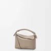 Bolso Mini Puzzle Edge en piel de becerro de grano suave