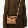 Bolso Mini Puzzle Edge en piel de becerro de grano suave Bolso Mini Puzzle Edge en piel de becerro de grano suave