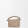 Bolso Mini Puzzle Edge en piel de becerro de grano suave Bolso Mini Puzzle Edge en piel de becerro de grano suave