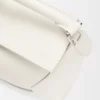 Bolso Mini Puzzle Edge en piel de becerro de grano suave
