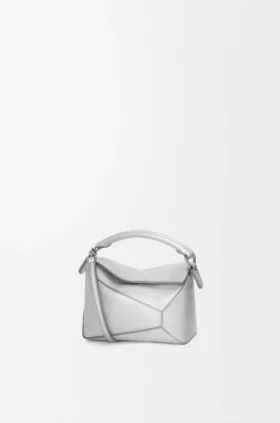 Bolso Mini Puzzle Edge en piel de cordero laminada