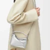 Bolso Mini Puzzle Edge en piel de cordero laminada Bolso Mini Puzzle Edge en piel de cordero laminada