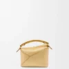 Bolso Mini Puzzle Edge en piel de cordero laminada Bolso Mini Puzzle Edge en piel de cordero laminada
