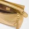 Bolso Mini Puzzle Edge en piel de cordero laminada Bolso Mini Puzzle Edge en piel de cordero laminada