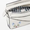 Bolso Mini Puzzle «Futurist Cat» en piel de becerro clásica Bolso Mini Puzzle «Futurist Cat» en piel de becerro clásica