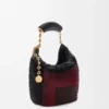 Bolso mini «Squeeze» de cuero con cuentas Bolso mini «Squeeze» de cuero con cuentas