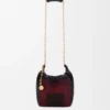 Bolso mini «Squeeze» de cuero con cuentas Bolso mini «Squeeze» de cuero con cuentas