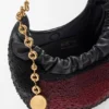 Bolso mini «Squeeze» de cuero con cuentas Bolso mini «Squeeze» de cuero con cuentas