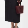 Bolso Pebble Bucket Mini en piel de becerro lisa