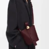 Bolso Pebble Bucket Mini en piel de becerro lisa