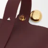 Bolso Pebble Bucket Mini en piel de becerro lisa
