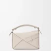 Bolso pequeño Panta Puzzle en piel de becerro brillante Bolso pequeño Panta Puzzle en piel de becerro brillante
