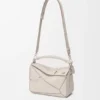 Bolso pequeño Panta Puzzle en piel de becerro brillante Bolso pequeño Panta Puzzle en piel de becerro brillante