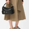 Bolso Puzzle Biker pequeño en piel de becerro brillante