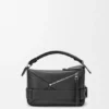 Bolso Puzzle Biker pequeño en piel de becerro brillante