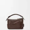 Bolso Puzzle Biker pequeño en piel de becerro brillante