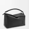 Bolso Puzzle Edge grande en piel de becerro granulada Bolso Puzzle Edge grande en piel de becerro granulada