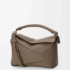 Bolso Puzzle Edge mediano en piel de becerro de grano suave Bolso Puzzle Edge mediano en piel de becerro de grano suave