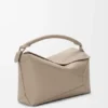 Bolso Puzzle Edge mediano en piel de becerro de grano suave Bolso Puzzle Edge mediano en piel de becerro de grano suave