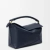 Bolso Puzzle Edge mediano en piel de becerro de grano suave Bolso Puzzle Edge mediano en piel de becerro de grano suave