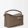 Bolso Puzzle Edge mediano en piel de becerro de grano suave Bolso Puzzle Edge mediano en piel de becerro de grano suave