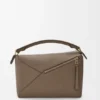 Bolso Puzzle Edge mediano en piel de becerro de grano suave Bolso Puzzle Edge mediano en piel de becerro de grano suave