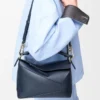 Bolso Puzzle Edge pequeño en piel de becerro de grano suave Bolso Puzzle Edge pequeño en piel de becerro de grano suave