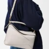 Bolso Puzzle Edge pequeño en piel de becerro de grano suave Bolso Puzzle Edge pequeño en piel de becerro de grano suave