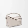 Bolso Puzzle Edge pequeño en piel de becerro de grano suave Bolso Puzzle Edge pequeño en piel de becerro de grano suave
