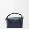 Bolso Puzzle Edge pequeño en piel de becerro de grano suave Bolso Puzzle Edge pequeño en piel de becerro de grano suave