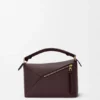 Bolso Puzzle Edge pequeño en piel de becerro de grano suave Bolso Puzzle Edge pequeño en piel de becerro de grano suave