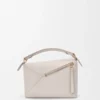 Bolso Puzzle Edge pequeño en piel de becerro de grano suave Bolso Puzzle Edge pequeño en piel de becerro de grano suave